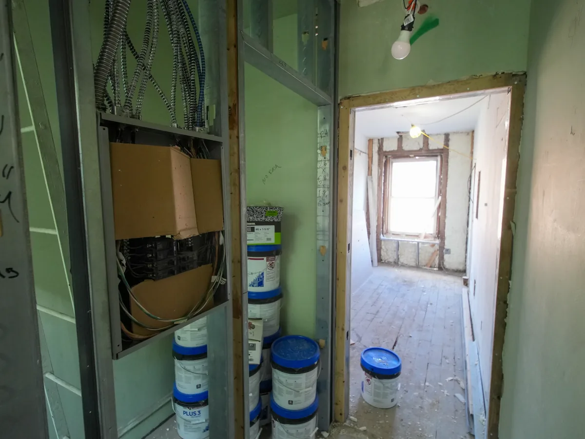 Pro Build estimator performing on-site assessment for drywall installation project