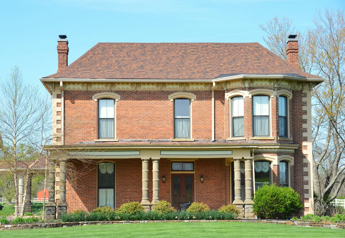 Pro Build estimator performing on-site assessment for historic home restoration project