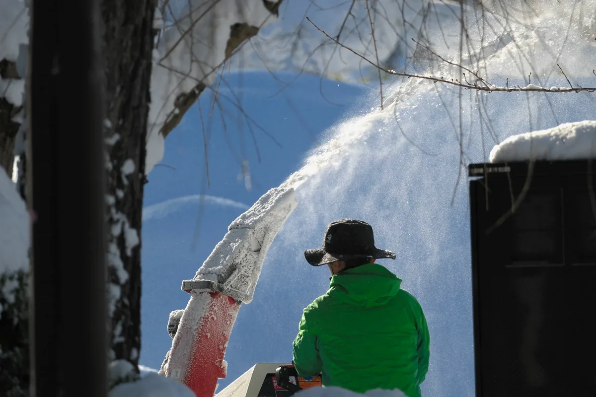 Pro Build estimator performing on-site assessment for ice dam removal project