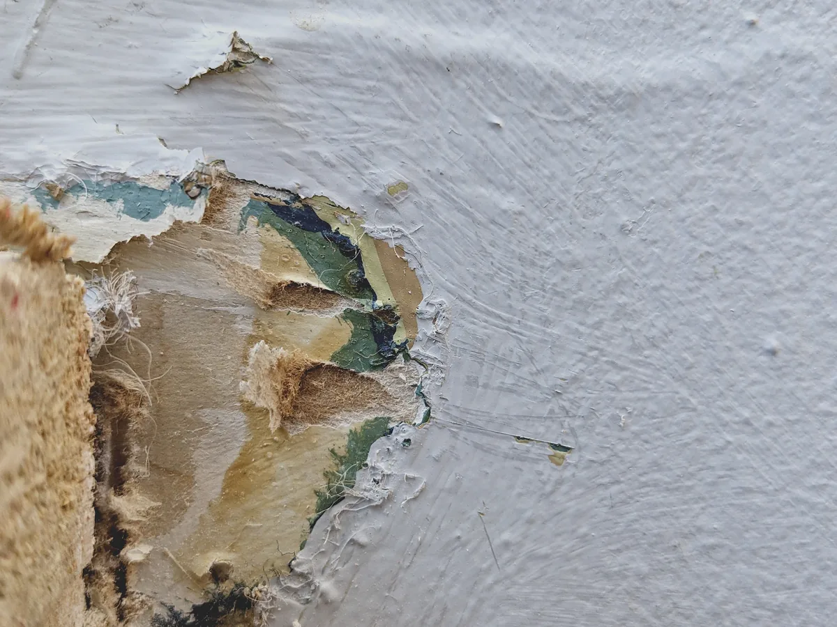 Roofer installing architectural shingles on a Massachusetts home